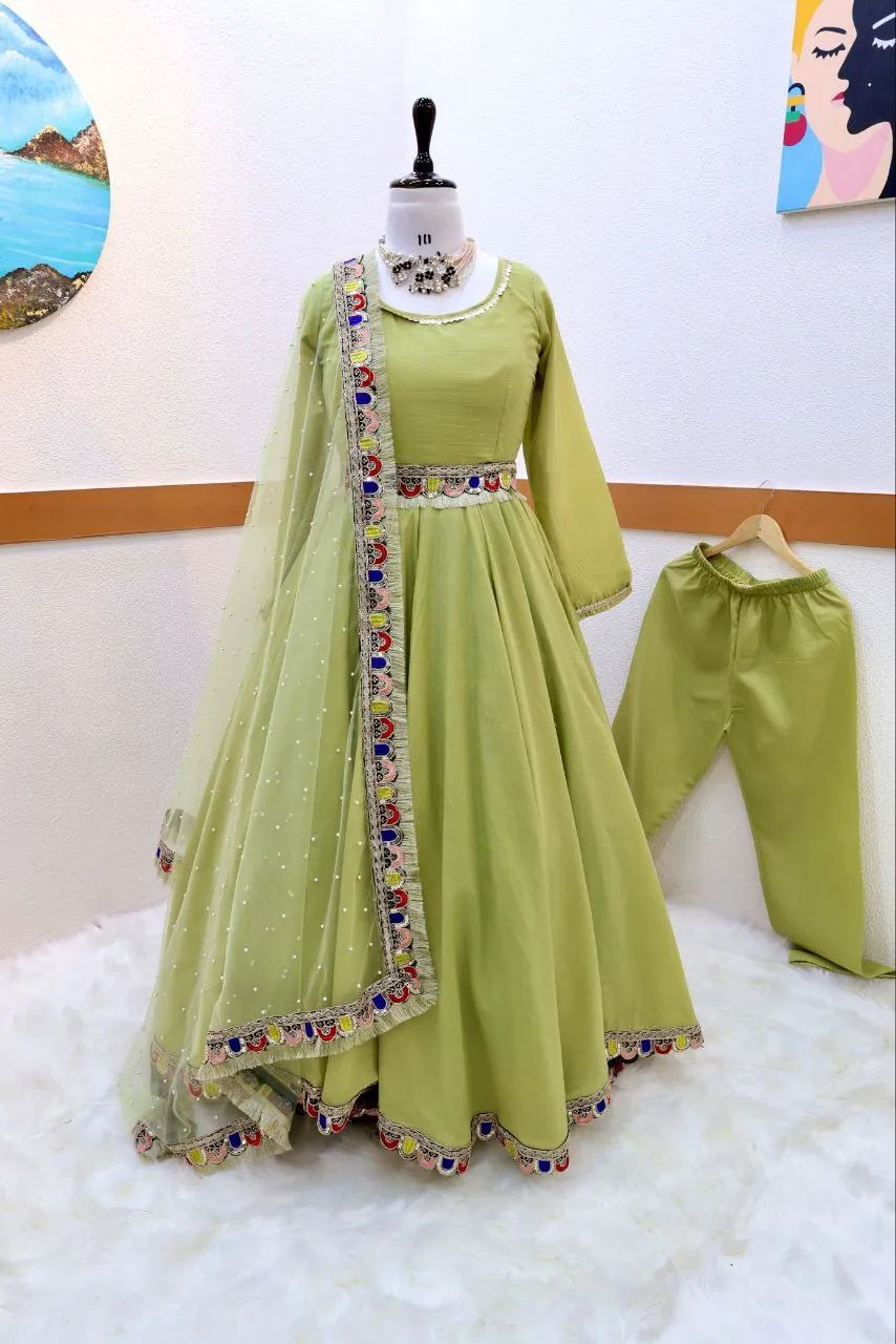 Light Green Luxurious Chinon Silk Embroidered Gown with Flowing 8 Meter Flair