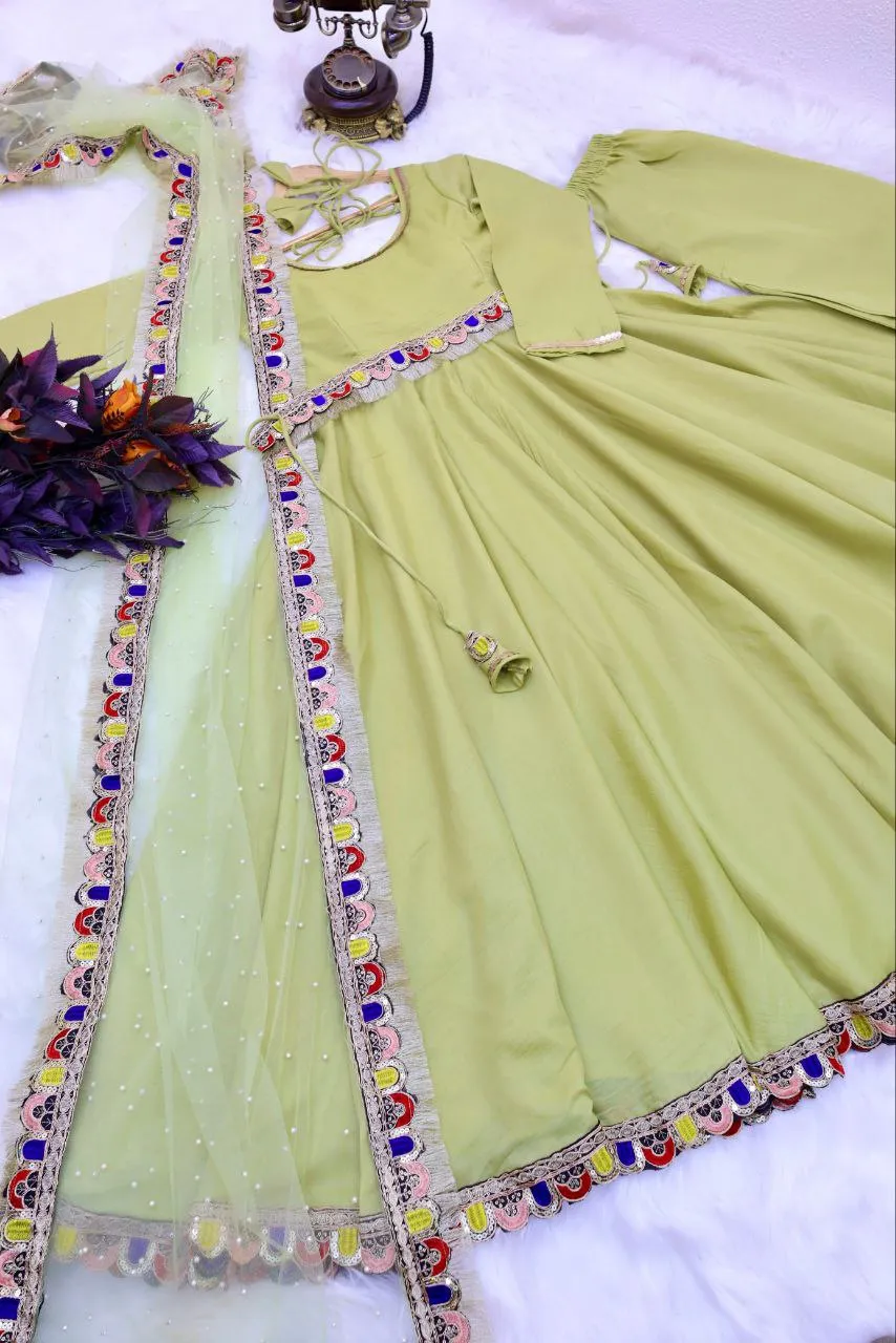 Light Green Luxurious Chinon Silk Embroidered Gown with Flowing 8 Meter Flair