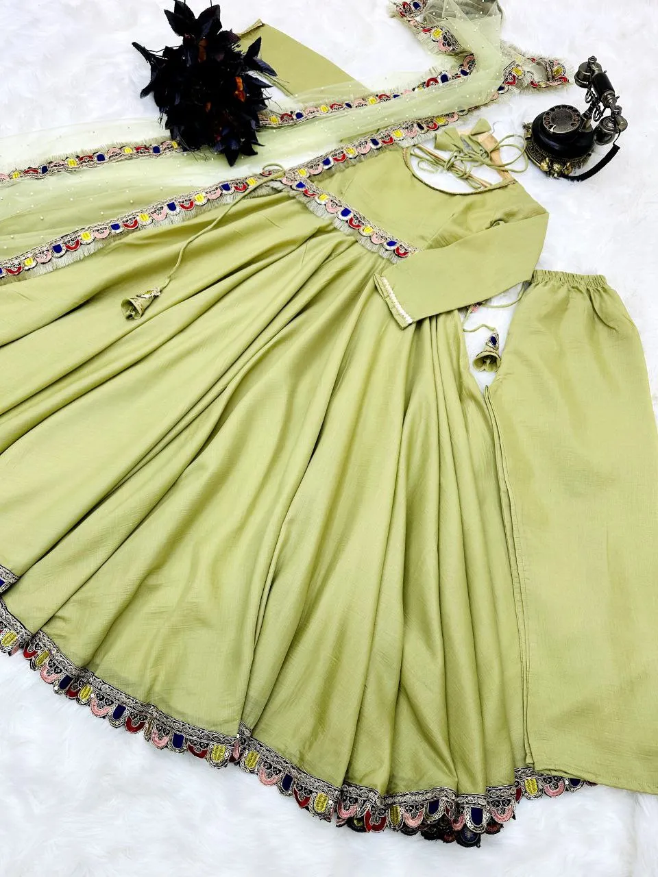 Light Green Luxurious Chinon Silk Embroidered Gown with Flowing 8 Meter Flair