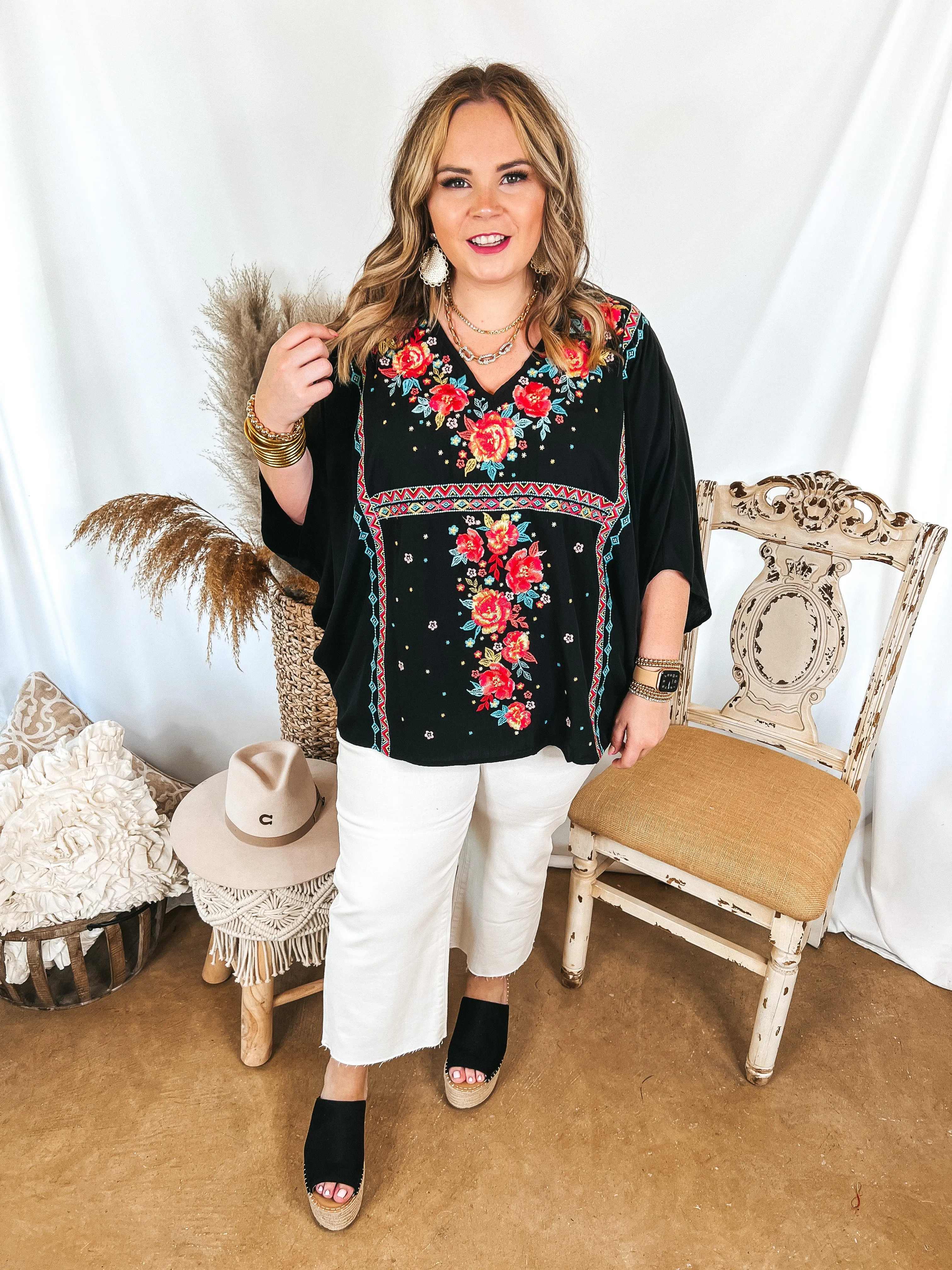 More To The Story Floral Embroidered Poncho Top in Black