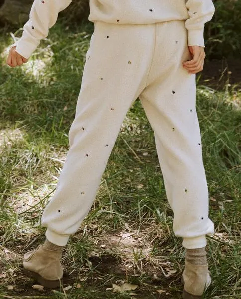 The Great - The Sherpa Cropped Sweatpant w/ Ditsy Floral Embroidery in Washed White